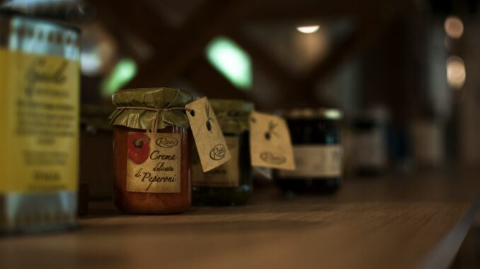 sauce photographie sélective de pots de pâte à tartiner aux saveurs variées